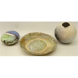  Smoke fired egg shell style vessel impressed 'E' to base, Peter Hough raku fired pebble and a stoneware dish with lava glaze by June Roddam, D22cm (3)  