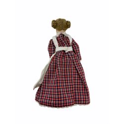 Heidi Ott doll in tartan dress, navy floral dress with white lace and ribbon detailing, striped blue and white dress and a 'Head to Toe' book