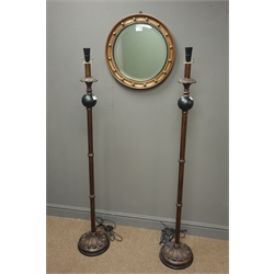  Small circular bevel edge wall mirror (W46cm) and pair of standard lamps, (H142cm)  