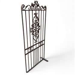 Victorian wrought iron vineyard gate, with ornate scrollwork and foliate acanthus leaf decoration, shaped cresting and central decorative panel, finished in rustic black painted finish
