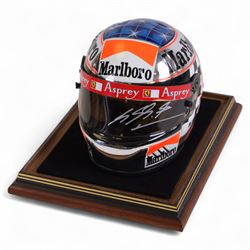 Half-size signed 1996 Michael Schumacher Ferrari helmet, signed at 2004 British Grand Prix...