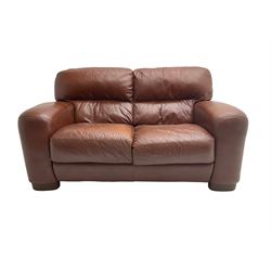 Three seat sofa upholstered in chocolate brown leather, and matching two seater sofa