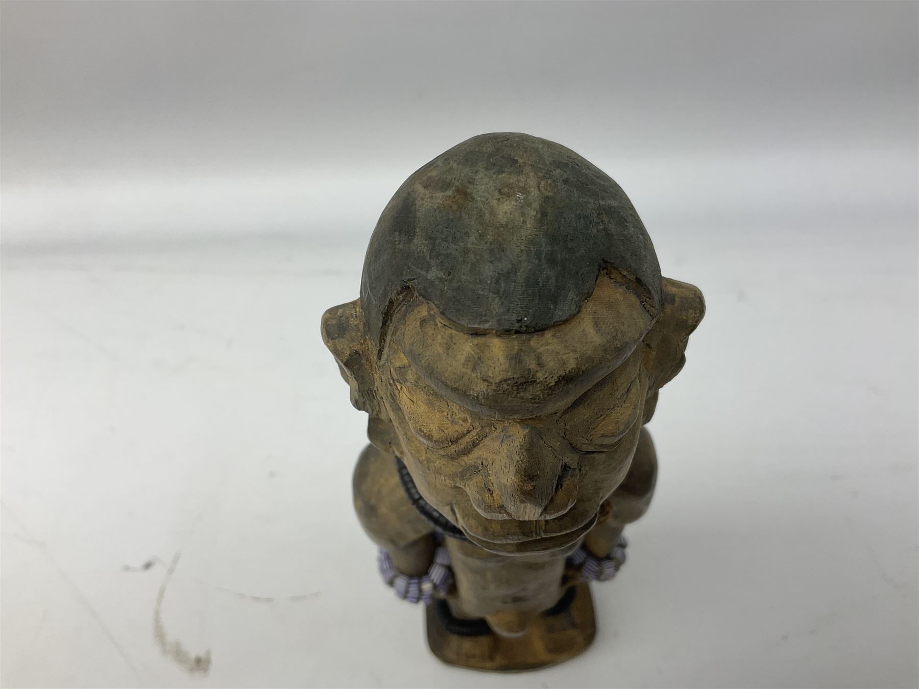 Early 20th century West African Yoruba family wooden figure of Orisha Oko, the god of farming/agriculture, carved from the solid, bears manuscript label of provenance verso H26.5cm