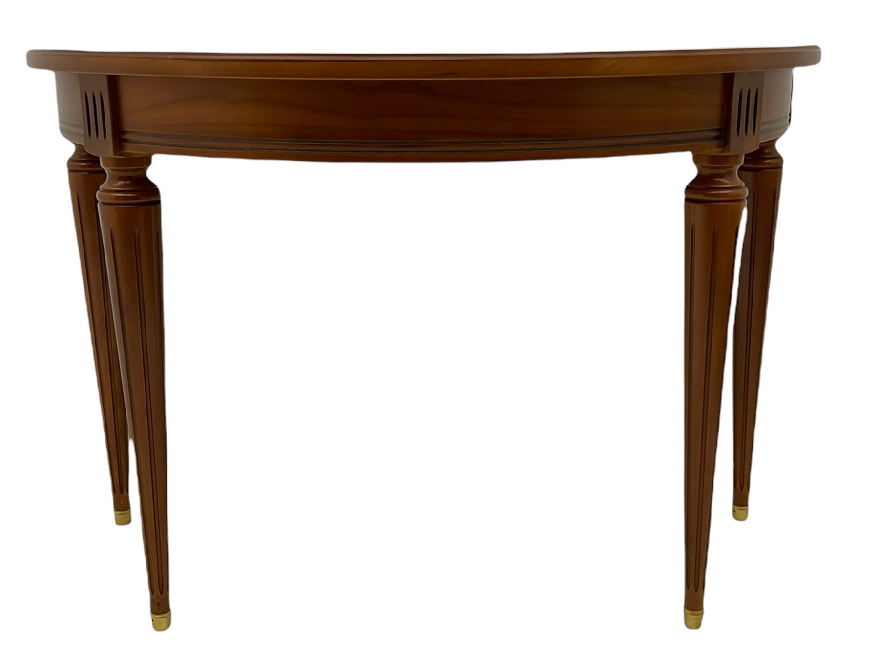 Contemporary cherry wood demi-lune console table, on tapering turned supports with fluting