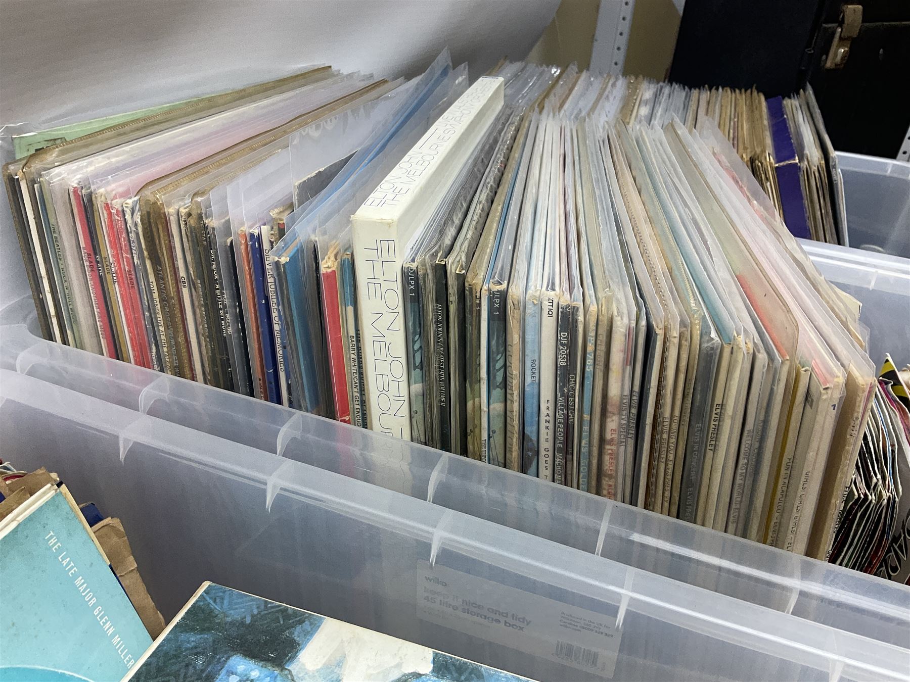 Large quantity of vinyl LPs, predominantly rock and pop, to include Elvis, Elton John, The Kinks, Deep Purple, Eurythmics, Whitney Houston, Phil Collins, Rolling Stones etc, in three boxes, together with quantity of 45 rpm records, Steepletone SRP1R-11 record player and record carry case
