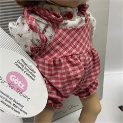 German Gotz articulated vinyl baby doll 'Claire' c1997 with original clothing, hat and labels; artist designed by Sylvia Natterer H35cm; boxed; and small child's wooden cased drum (2)