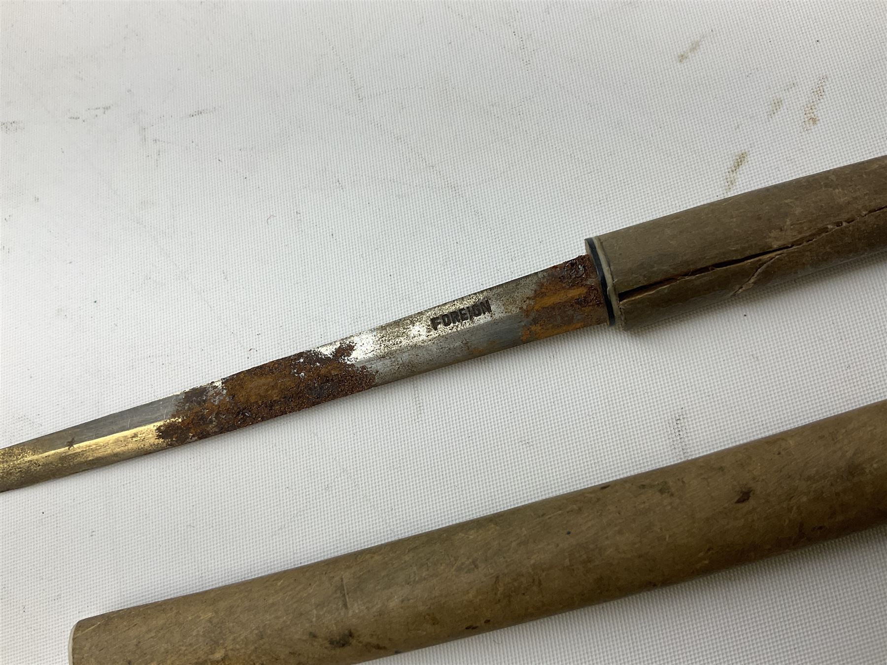 Malayan Kris dagger, the 31.5cm double edged straight heavy damascus blade with copper ferrule; carved hardwood grip; in large wooden throated scabbard with floral decorated white metal covering L47.5cm overall; a kris blade with adapted antler grip; and five various small daggers/letter openers (7)