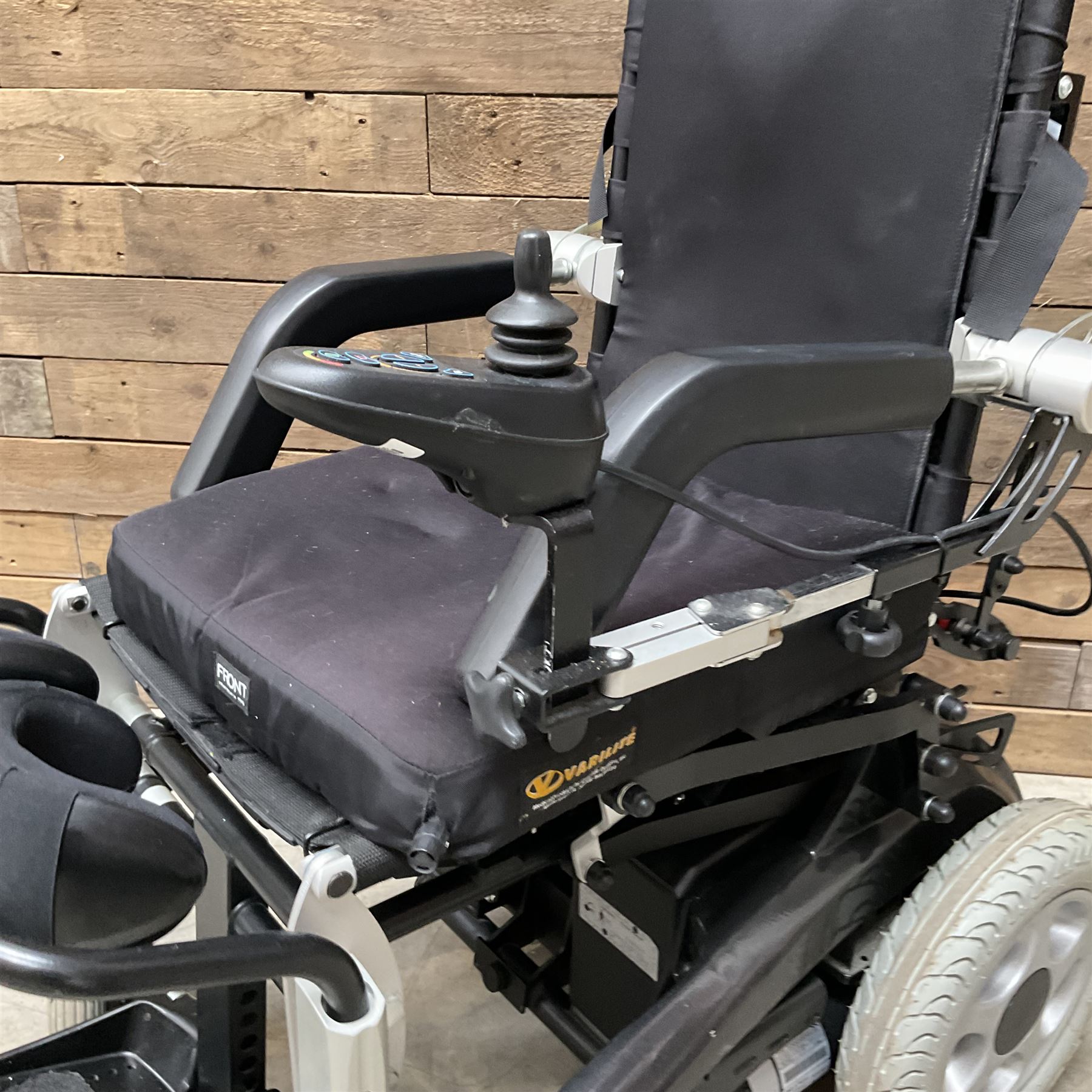 Permobil LSA Lifestand seated and standing wheelchair
