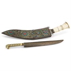 Nepalese kukri with engraved blade, bone hilt and jewelled scabbard and an Eastern dagger ...