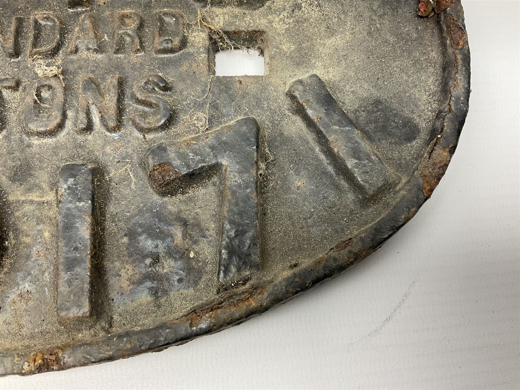 Three cast iron railway wagon plates of D shaped form to include Southern Railway, LMS and GWR, L27.5cm