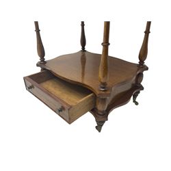 Late 20th century mahogany whatnot, four shaped tiers with turned supports, fitted with single drawer, on turned feet with brass castors