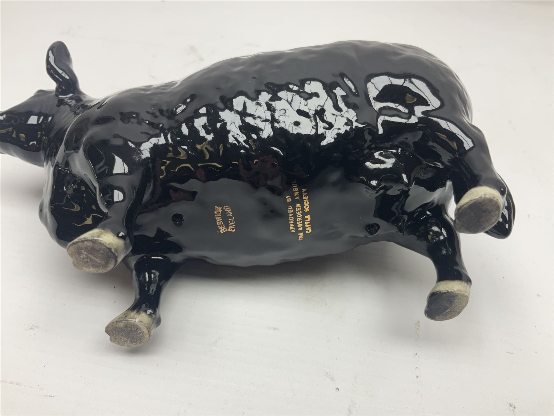 Beswick Aberdeen Angus family group, comprising bull 1562, cow 1563 and calf 1827A