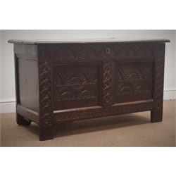  Early 19th century heavily carved coffer with hinged lid, panelled sides and stile supports, W110cm, H63cm, D51cm  