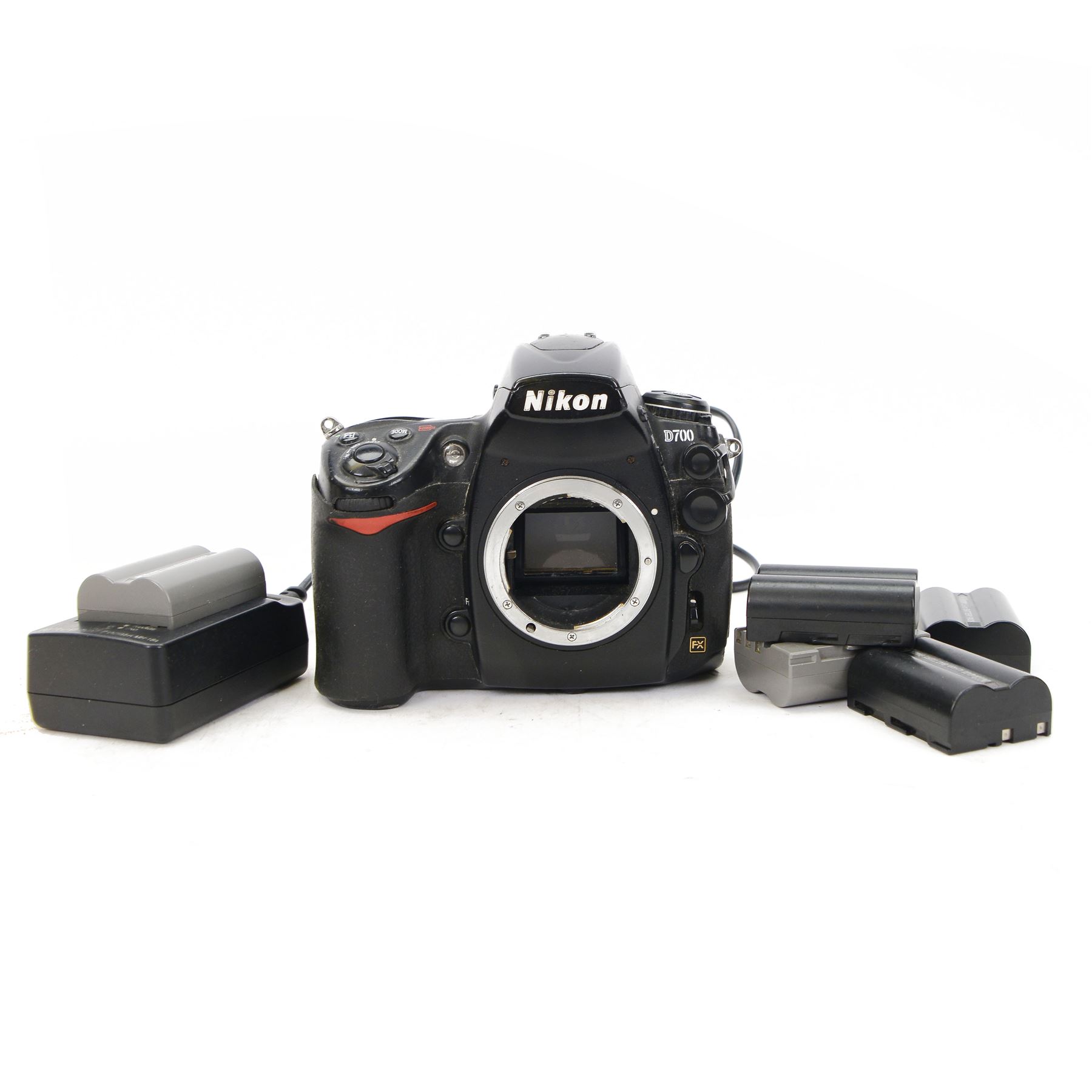 Nikon D700 digital SLR camera body, serial no. 2178036, with some associated battery packs and accessories
