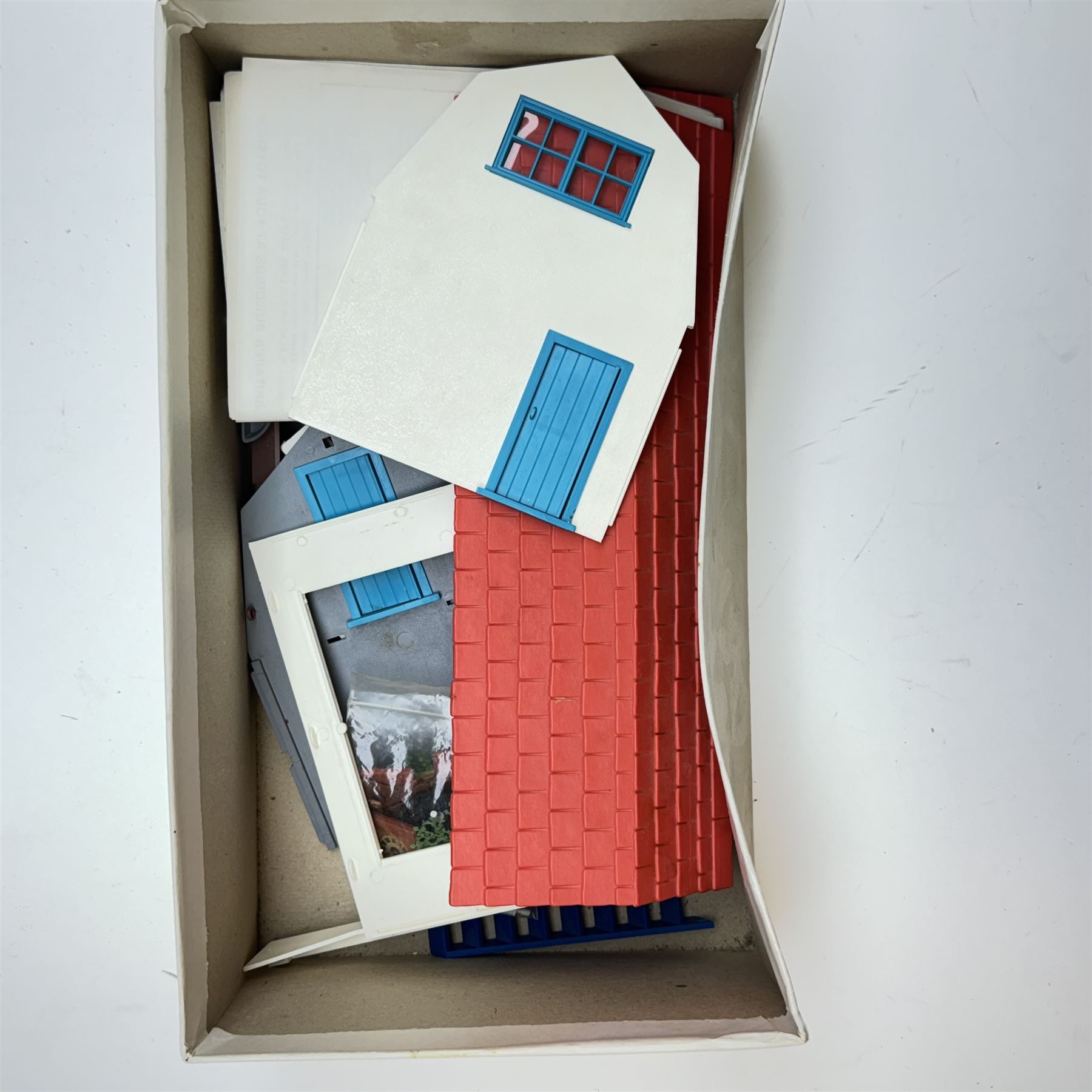 Britains 1:32 scale farm implements, vehicles and figures,  comprising 9563 Hay Baler, 9539 Seed Drill, 9534 Disc Harrow, 9537 Acrobat Rake, 9530 Three Furrow Plough, 9547 Horse Box with Horse, 9576 Farm Land Rover, 2078 male Rider with Horse, 9533 Roller, 9538 Vari-Spreader, 9536 Cultivator, three 1742 Hay Bales, 1740 Milk Churns and 1741 Sacks, all boxed, together with trees, walls, buildings and loose vehicles