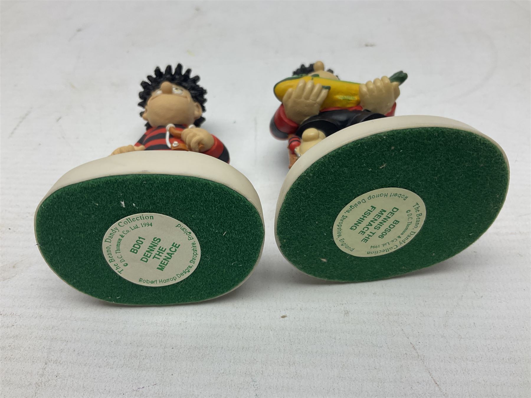 Thirteen Robert Harrop figures from the Beano Dandy collection, comprising Yo-Yo Collectors Piece 1996, Desperate Dan BD03, Cuthbert Cringeworthy BD08, Teach BD06, 'Erbert BD14, Toots BD12, Winston BD17, Fatty BD07, Dennis The Menace BD01, Dennis the Menace Fishing BD806, Sydney BD13, Wilfrid BD15 and Plug BD11