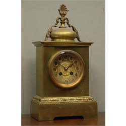  Early 20th century gilt metal and brass mantel clock, concave Arabic dial with pierced floral mount, stepped acanthus moulded plinth, twin train movement striking on coil, H37cm  