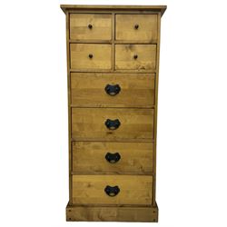 Laura Ashley - contemporary oak tall chest of drawers from the Garrat range, honeycomb rectangular top featuring central groove, over four small drawers with brass knob pulls and four long drawers with drop handles, on plinth base