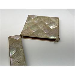 A 19th century mother of pearl card case, with foliate engraved lozenges, H10.5cm.
