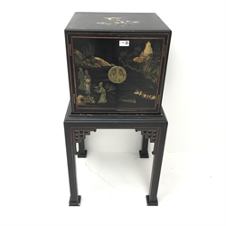  Early 20th century Chinoiserie ebonised cabinet on stand, two doors, square tapering supports, W51cm, H99cm, D47cm  