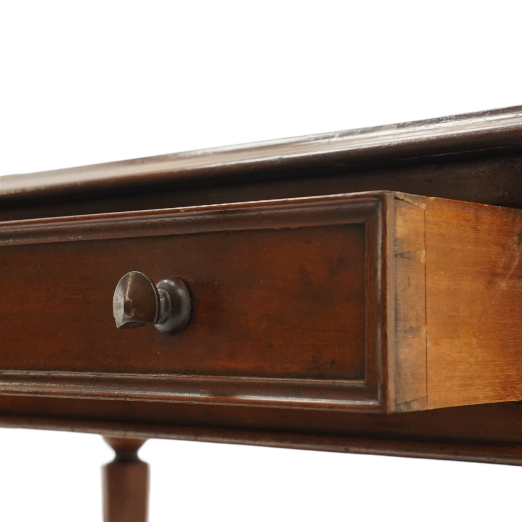 Mid Victorian four drawer mahogany partners' writing table, with leather inset top with moulded edge, with two frieze drawers to either side, on turned supports terminating in castors