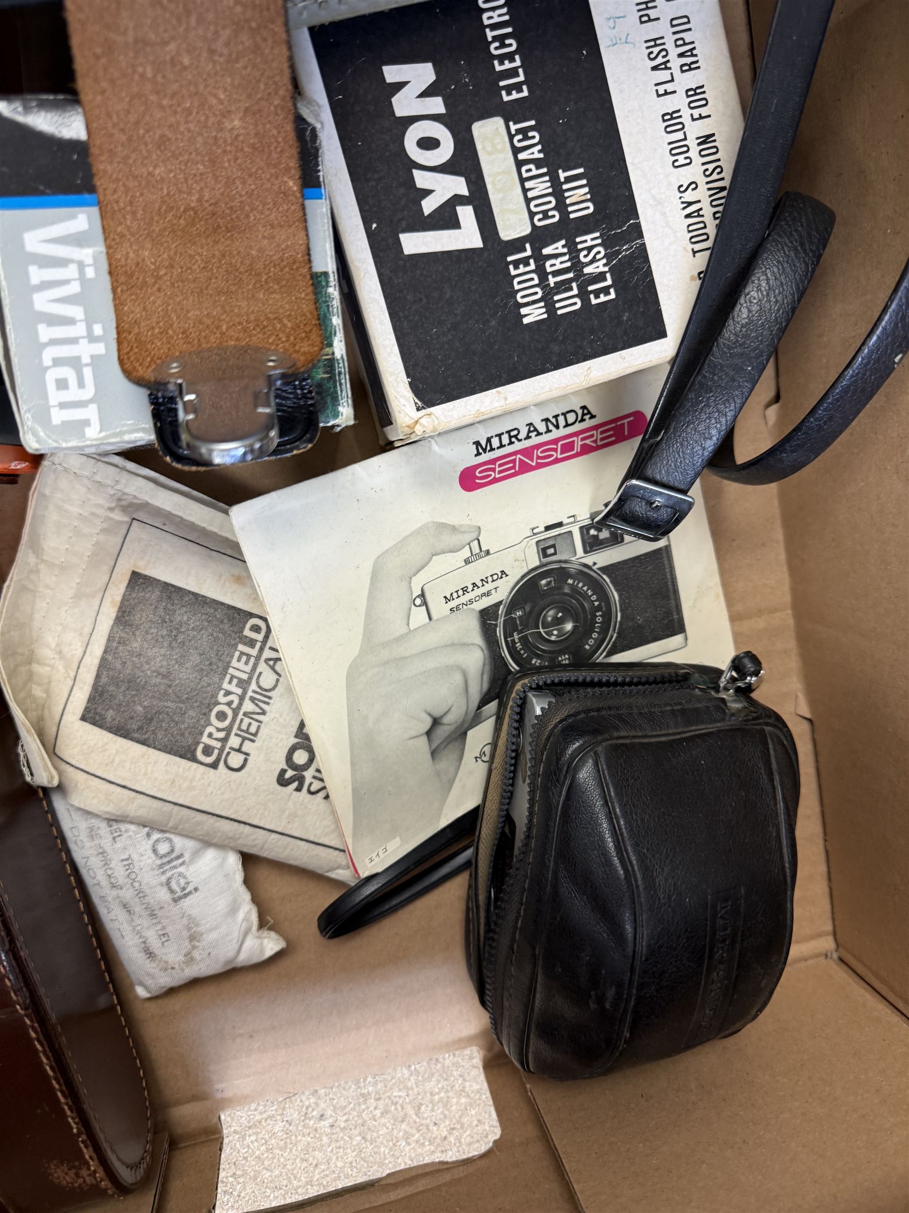 Voigtlander Bessa I folding camera, Miranda Sensoret, Canon Auto Zoom Super 8 cine camera in case and camera accessories including Voigtlander filters, Vivitar wide angle telephoto lens, Lyon 708 ultra compact electronic flash unit and a Photax Planet 4 slide viewer