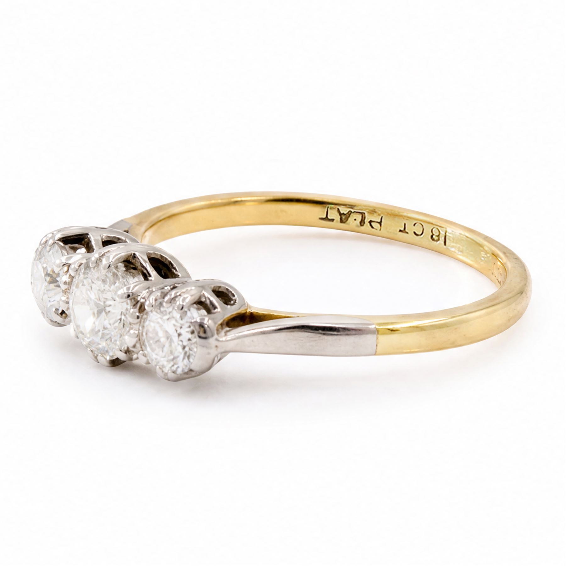 Gold three stone diamond ring, each multi claw set with an old cut diamond, stamped 18ct Plat, total diamond weight approx 0.65 carat