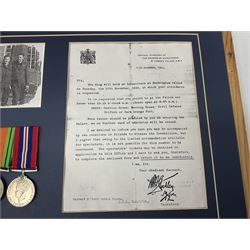 Warrant Officer Gordon Pearce D.F.C. R.A.F.V.R. - display of five medals comprising copy Distinguished Flying Cross, copy Air Crew Europe Star, 1939-45 Star, 1939-45 War Medal and Defence Medal; framed with RAF cap badge, two copy photographs in uniform and copy of investiture letter; mounted and glazed in pine frame 34 x 66cm