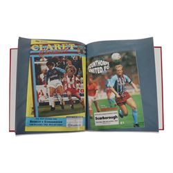 Comprehensive collection of approximately one hundred and seventy Scarborough FC football programmes for the 1990/91, 1991/92 and 1992/93  seasons, all filed within six dedicated Scarborough FC red Home and Away binders