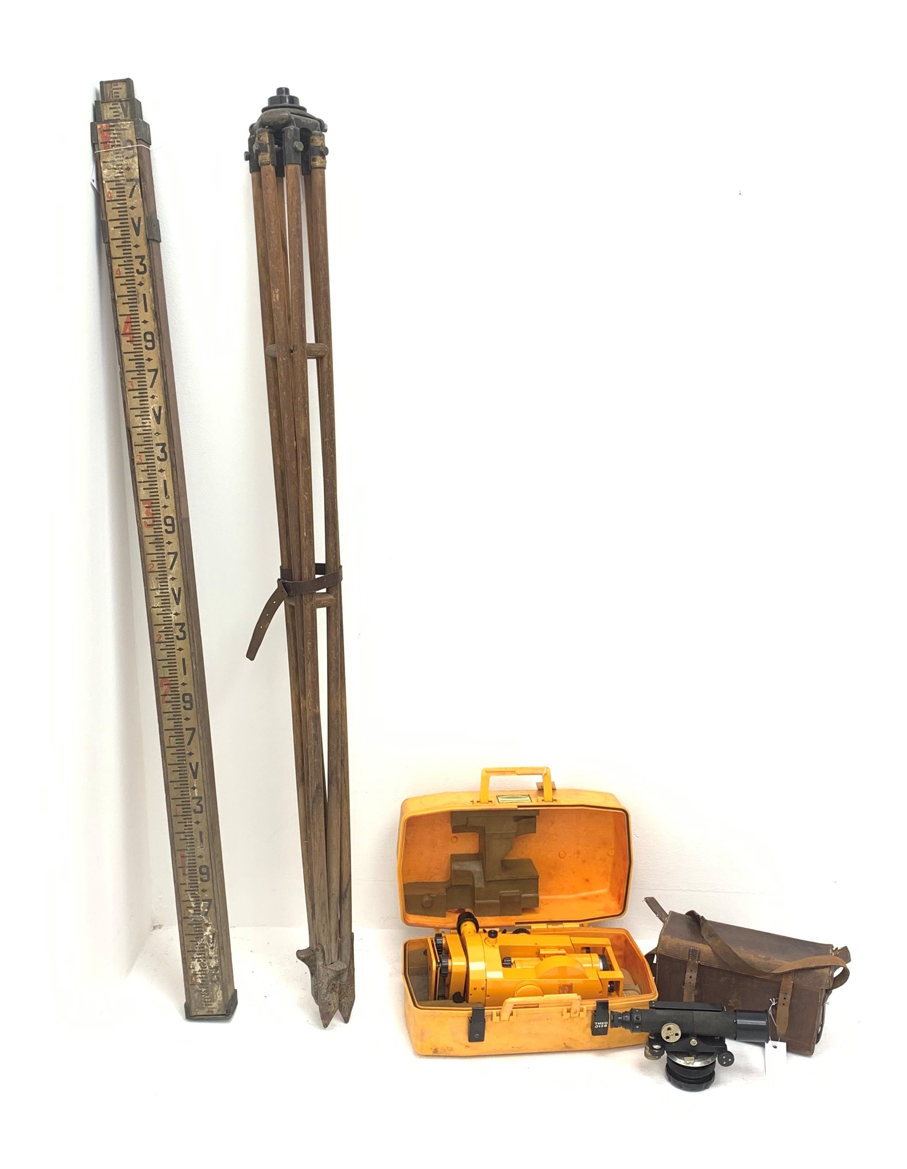 Carl Zeiss Theo 015B orange painted theodolite serial no.251267 in fitted case with accessories; E.R. Watts & Sons London level with black crackled body, serial no.1888, in calf leather carrying case; wooden folding tripod and telescopic measuring staff (4)