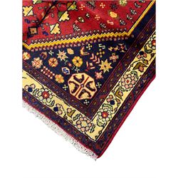 Small Persian Abadeh rug, blue ground with red lozenge field decorated with small bird and plant motifs, triple band border with floral design