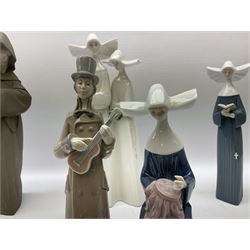 Three Lladro figures of nuns comprising Prayerful Moment no. 5500, Time to Sew no. 5501 and Two Nuns model no. 4611, together with figure of a monk no. 2060, and further Lladro bell figure