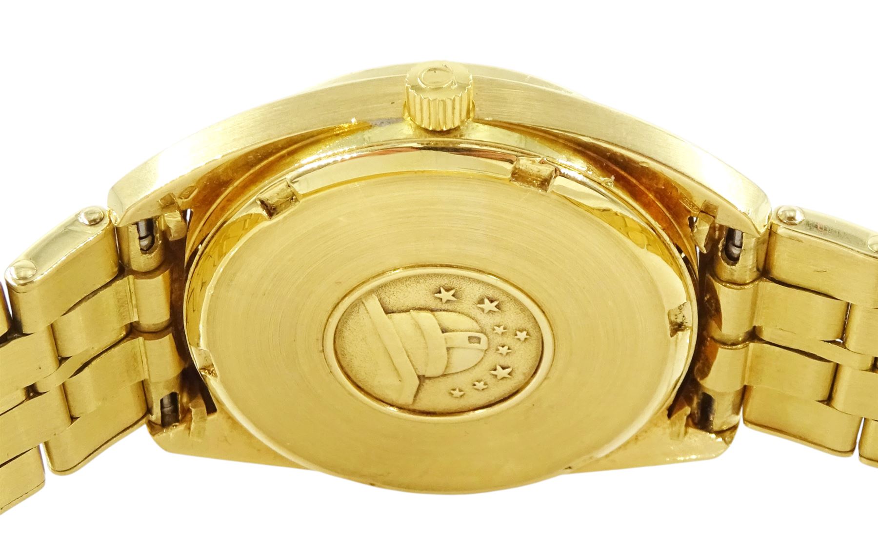Omega Constellation gentleman's 18ct gold chronometer automatic wristwatch, Ref. 168.0057, Cal 1021, champagne dial with day / date aperture and baton hour markers, stamped 750 with Helvetia hallmark, on original 18ct gold expanding bracelet, with fold-over clasp, London import mark 1973