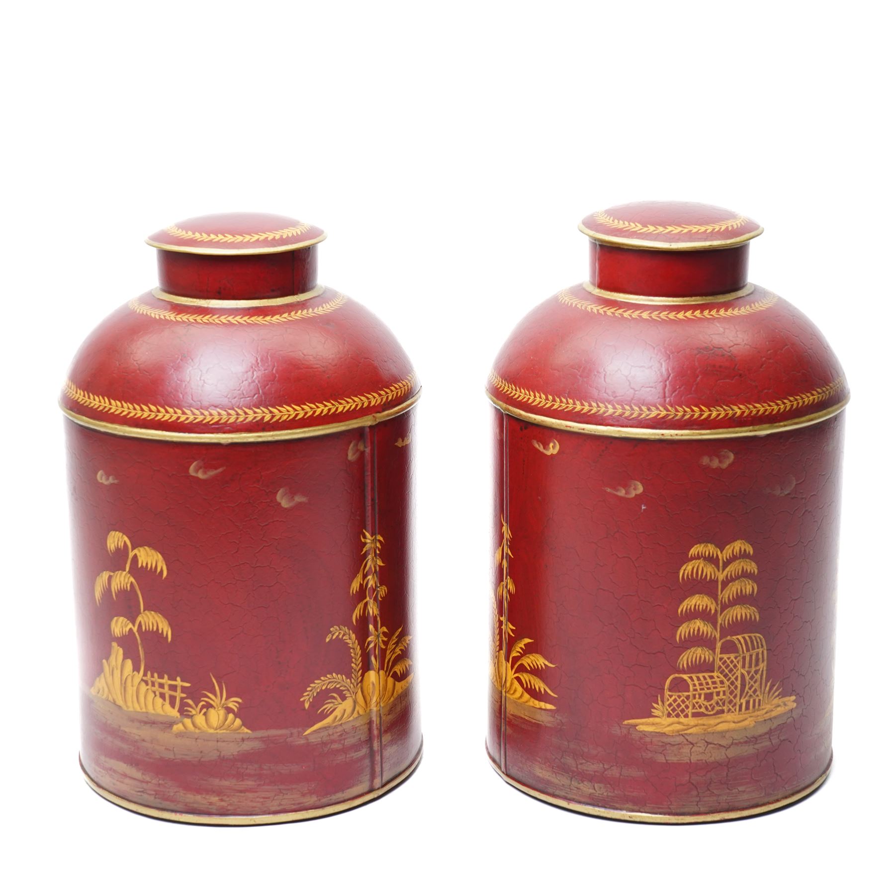 Pair of red toleware style tea cannisters, painted with fishermen, H36cm 