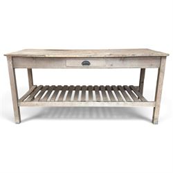 Large 19th century painted pitch pine scullery table, rectangular triple plank top fitted with single drawer, raised on square supports united by slatted under-tier