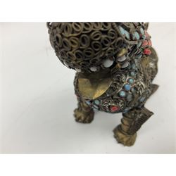 Early 20th century Chinese filigree brass model of a Foo Dog, with turquoise and coral roundels and lozenges, H11.5cm