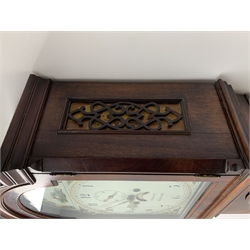 George III mahogany longcase clock, the hood with stepped moulded arch pediment above glazed door, fret work grille to each side, figured trunk door and base, enamel Arabic dial painted with country house scene and floral spandrels signed 'S. Wright, Watford', subsidiary seconds dial and date aperture, eight day movement striking the hours on bell, H212cm (two weights and pendulum)