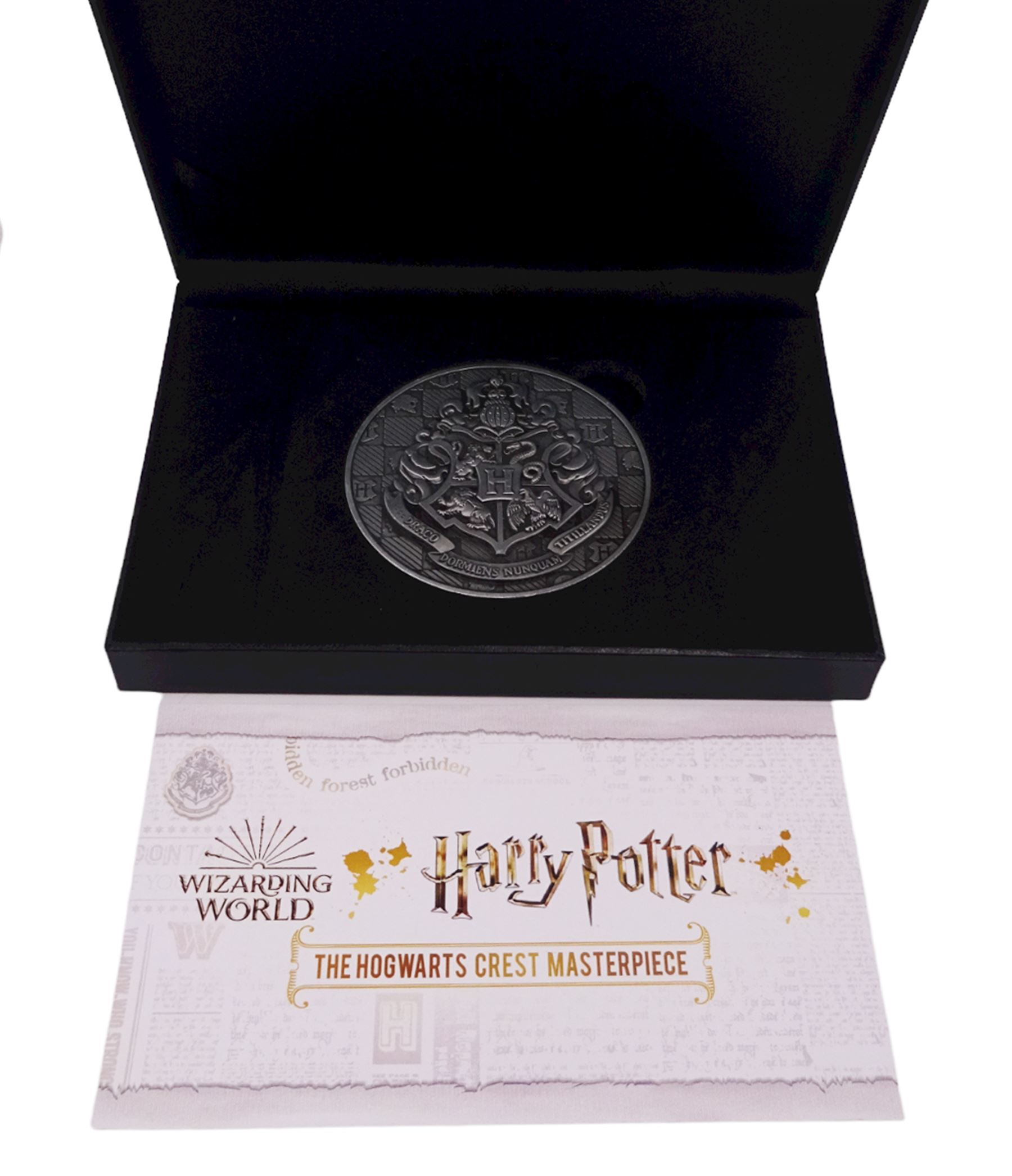 Harry Potter Wizarding World Official Coin Collection comprising twelve Samoa half dollar coins and a Harry Potter 'The Hogwarts Crest Masterpiece' medallion, cased with certificate