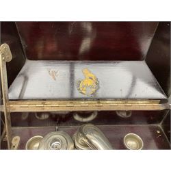 Early 20th century wind up gramophone set in a wooden case with twin door sound hole to the front and tins of 'His Masters Voice' needles