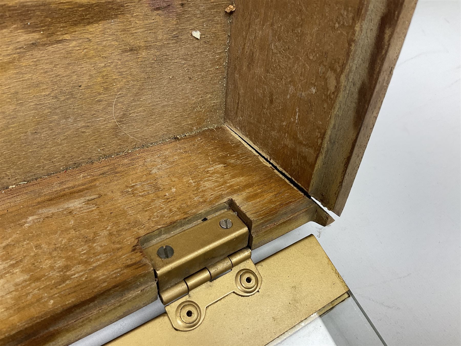 Benson and Hedges countertop glazed display cabinet, the glass hinged lid with white labelling of various cigarettes and cigars, the gilded metal bands with black lettering, W38cm D33cm H8cm