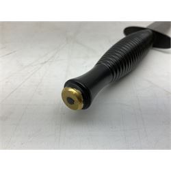 Gulf War period commando knife with 17cm double-edged steel blade etched with the crest and motto 'By Strength and Guile', blackened cross-piece and grip; in webbing scabbard L31cm overall