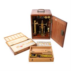 Late 19th/early 20th century Negretti and Zambra London brass microscope, with lenses, in ...