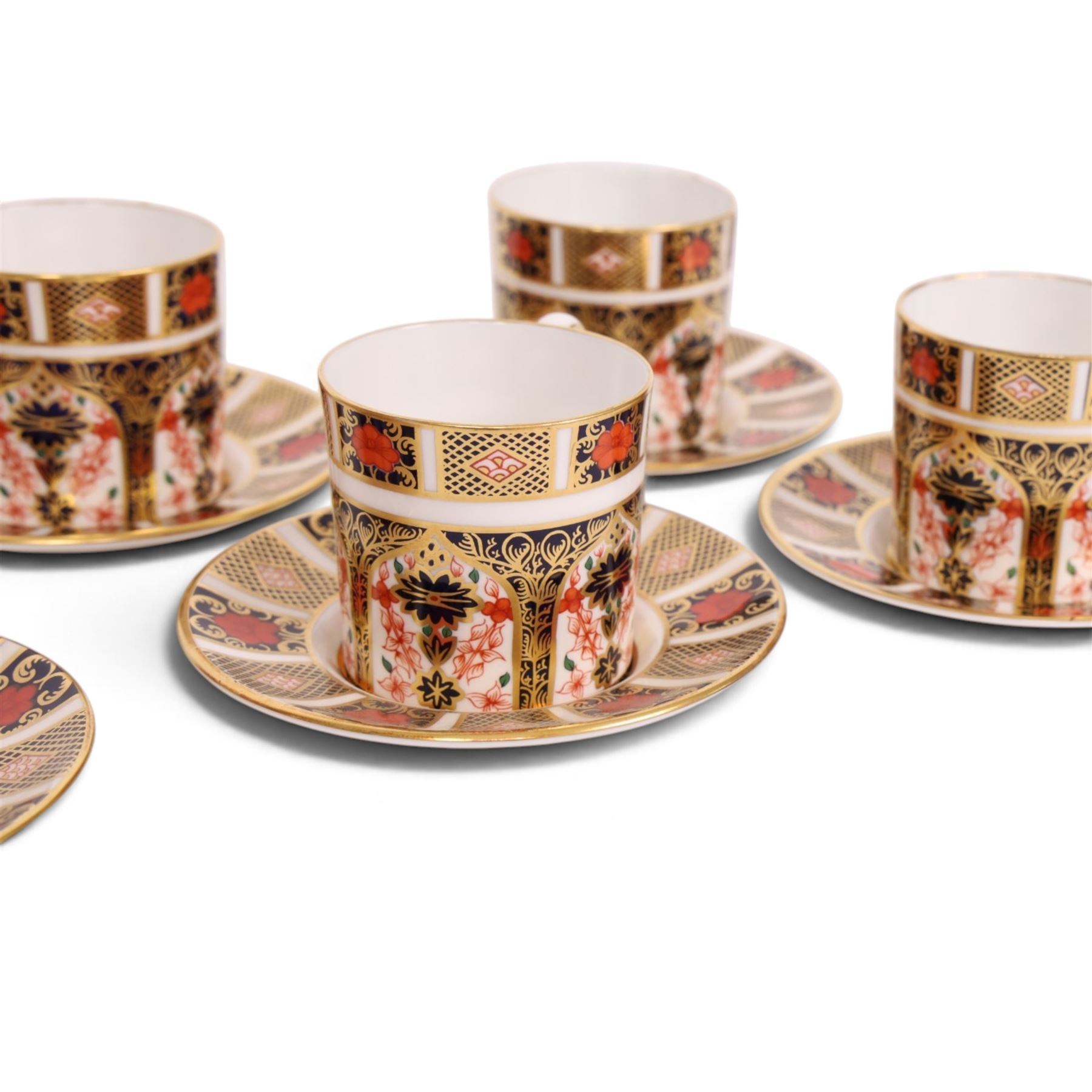Eight Royal Crown Derby Old Imari 1128 pattern coffee cans and saucers