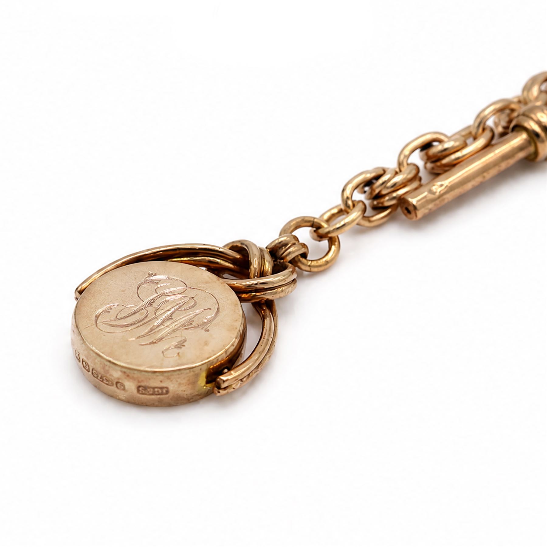 Early 20th century 9ct rose gold fancy link Albert chain, with rose gold swivel fob, monogrammed with initials, Birmingham 1923 