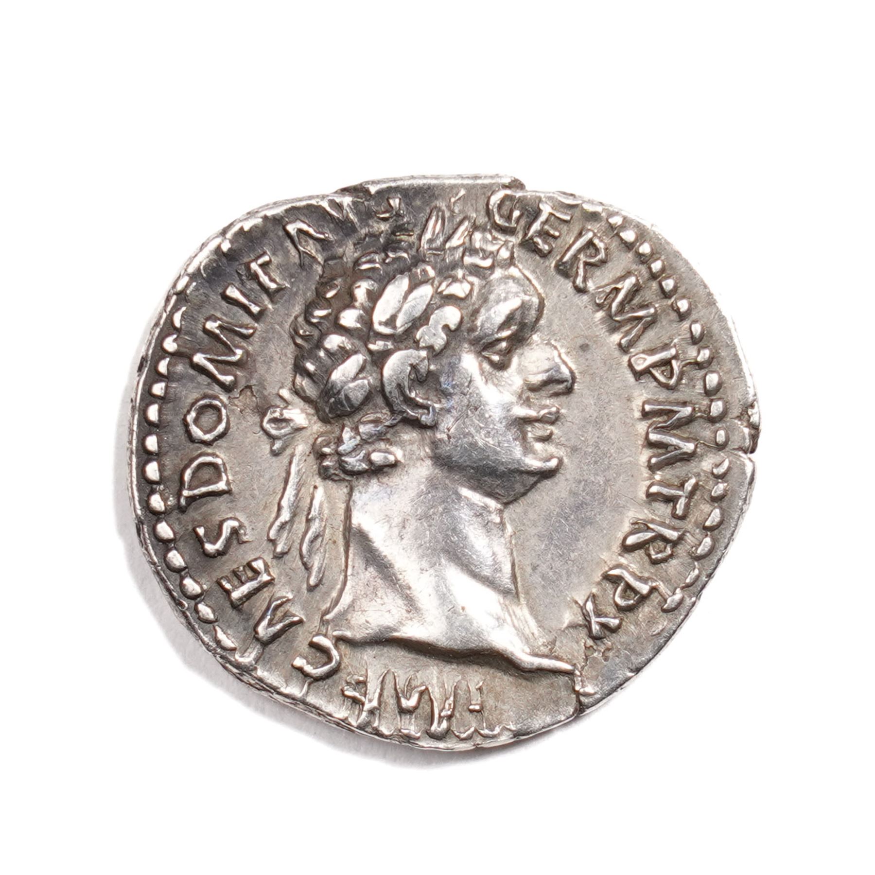 Roman Empire - Domitian (AD 81-96): Silver Denarius coin, obverse laureate head of Domitian right, legend IMP CAES DOMITIAN AVG GERM P M TR P; reverse Minerva standing right, holding spear and shield with owl at feet, legend IMP XXI COS XV CENS P P P; c.AD 90-91, Rome mint
