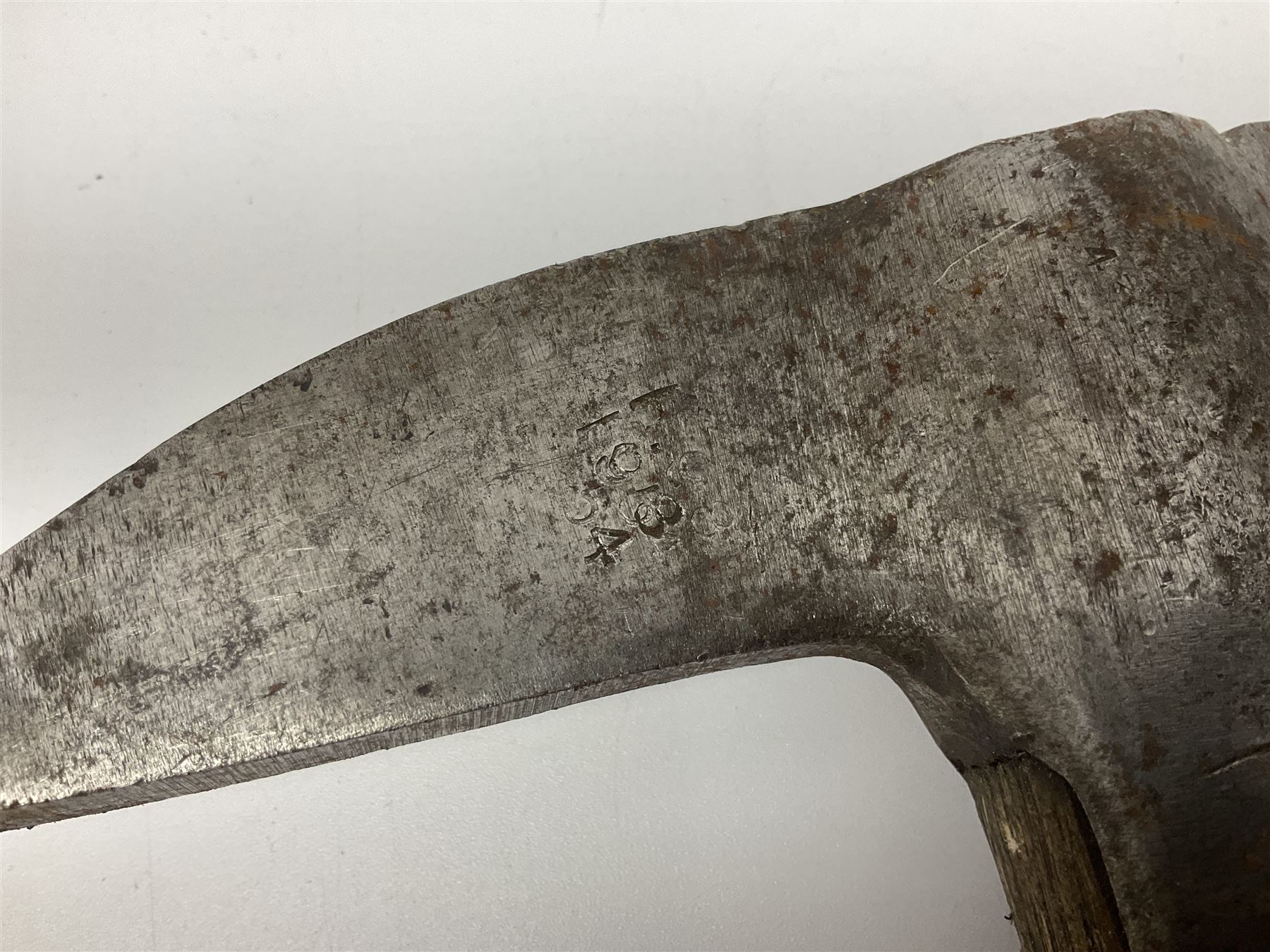Post-War military type fireman's axe impressed 'PERKS 1953/54' with additional indistinct mark probably WD arrow, ash handle L39cm; and another stonemason's(?) double headed axe with mallet shaped shaft (2)