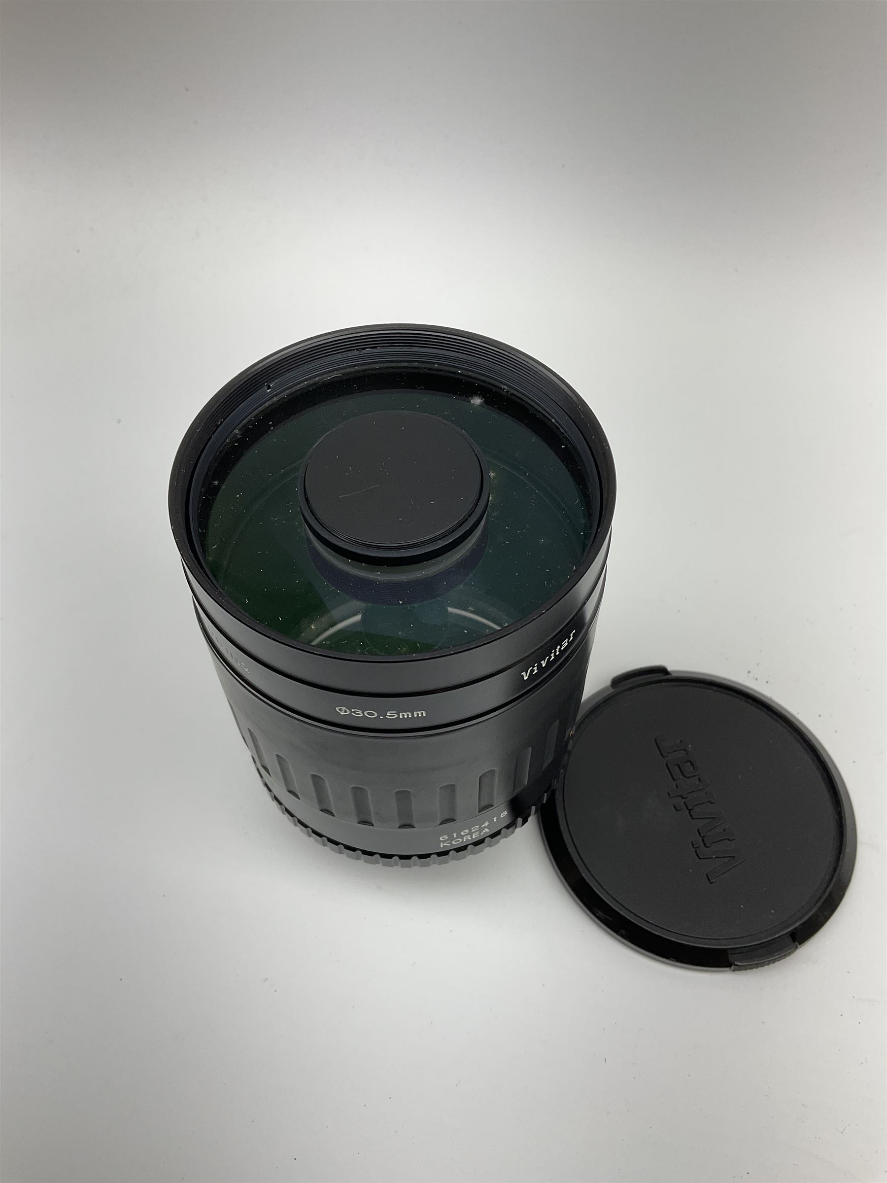 Olympus OM2 camera, 'no.264258', fitted with Olympus 'OM System G.Zuiko Auto-W 1:2.8 f35mm' lens and two other lenses, in a carry case