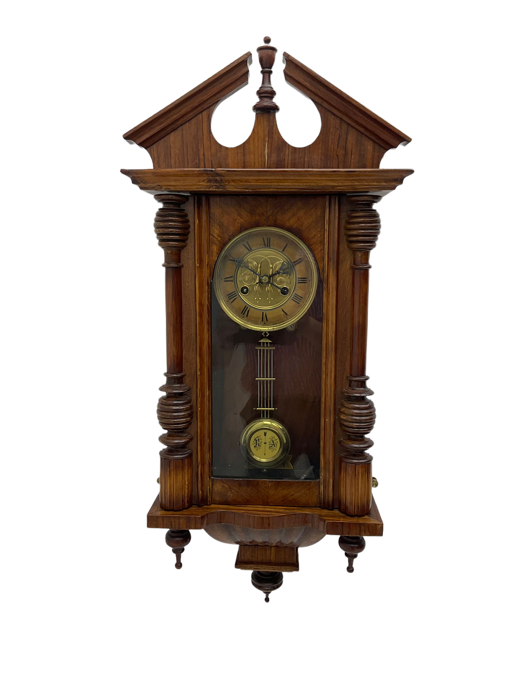German early 20th century wall clock in a mahogany case with an