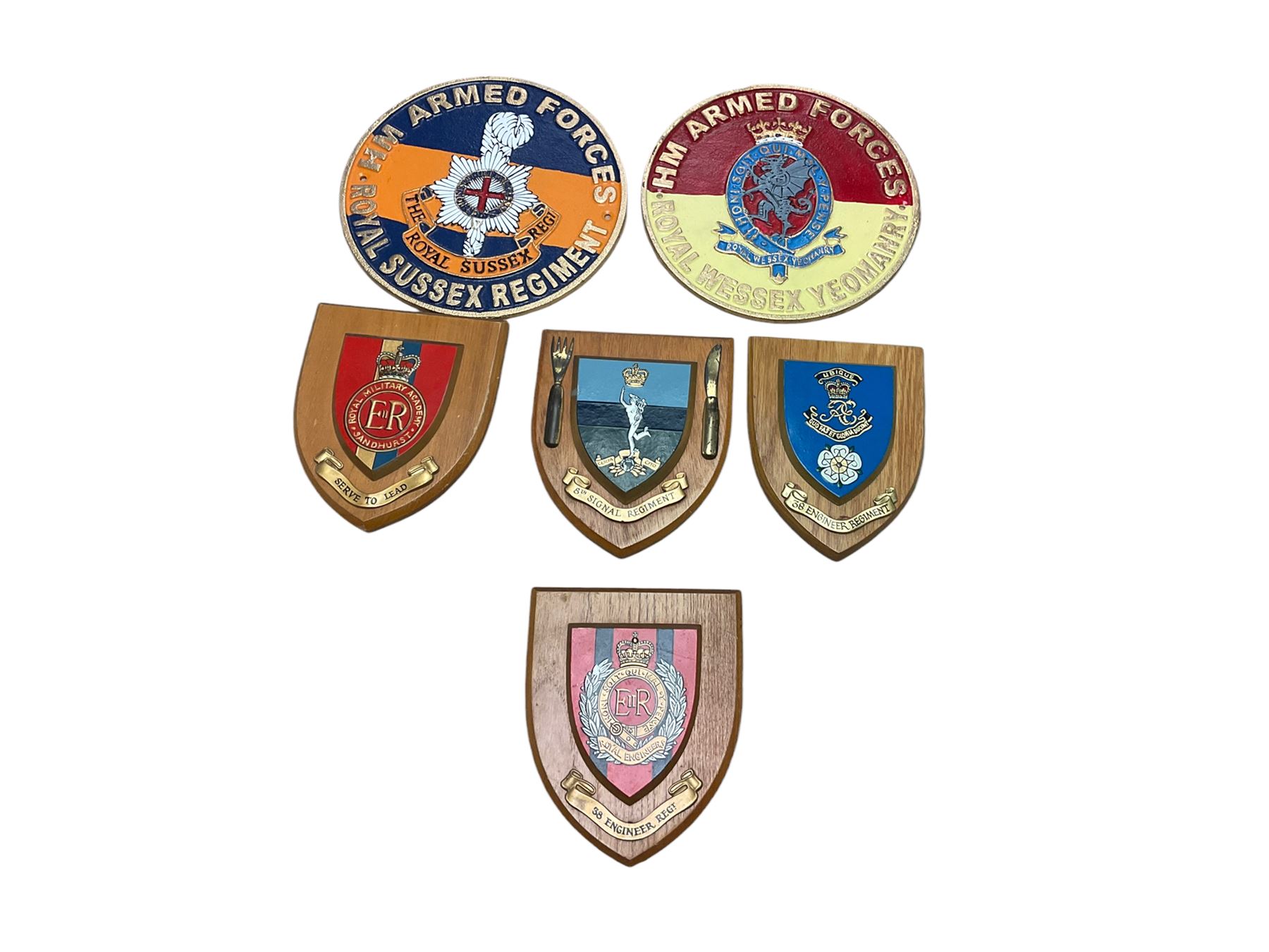 Collection of military shields and cast iron signs, including Royal Wessex Yeomanry, Royal Sussex Regiment etc 
