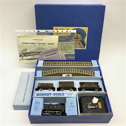 Hornby Dublo - three-rail EDG7 Tank Goods train set with LMS 0-6-2 tank locomotive No.6917, two wagons, guards van, quantity of straight and curved track and controller with tested ticket, boxed with instructions, guarantee, oil and spanner.